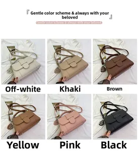 Detail view of stylish lychee texture handbags in six colors with silver round pendants