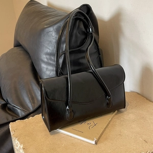 Minimalist black glossy PU leather underarm shoulder bag with sleek rectangular flap