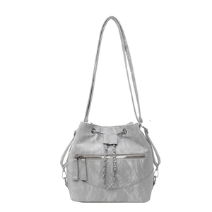 Modern grey drawstring bucket bag with silver chain straps and dual front zippers