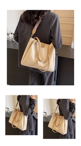 Détail du sac cabas beige avec anses brunes et large bandoulière tissée aux motifs ethniques
