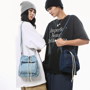 Fashionable denim drawstring bucket bags in light and dark blue for men and women