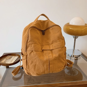 Sac à dos en toile marron clair rétro avec double fermeture éclair et poches latérales