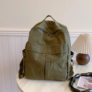 Sac à dos en toile délavée vert olive pour femme avec grande capacité et style rétro