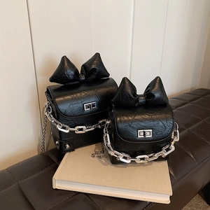 Mini black quilted chain bags with oversized bow and silver hardware in two sizes