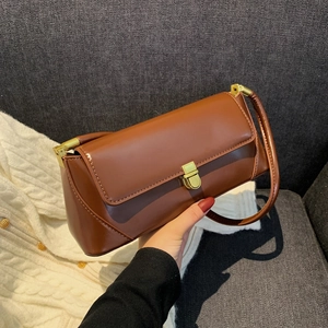 Minimalist vintage brown matte leather shoulder bag with gold clasp and slim strap