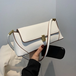 Chic white leather underarm bag with vintage gold buckle and slim brown edge paint