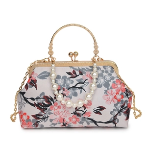 Vintage floral shell bag with pearl handle and golden kiss-lock clasp for women