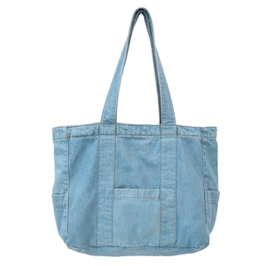 Light blue denim tote bag with multiple pockets and double straps for daily commute