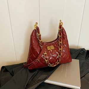 Chic quilted wine red hobo bag with gold chain strap and glossy faux leather finish