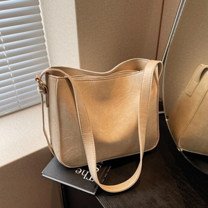 Sac Seau en Cuir PU Mode Rétro pour Femmes Sac à Bandoulière de Grande Capacité Couleur Unie Sac à Main Décontracté