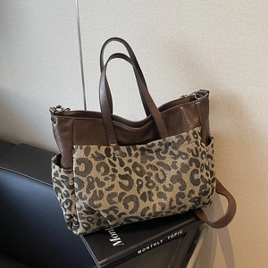 Retro leopard print and brown leather tote bag with front pocket and metal rivets