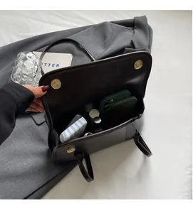 Large capacity vintage dark brown leather shoulder bag interior space with daily essentials