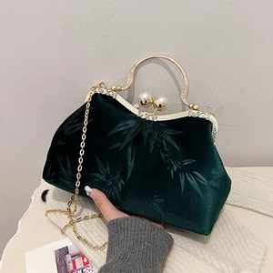 Vintage dark green velvet handbag with bamboo embroidery and pearl clasp