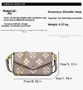 Detail view of floral print crossbody bag with dimensions 21x13x5cm and chain strap