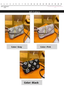 Detail view of stylish envelope crossbody bags in grey, pink, and black colors
