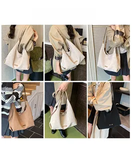 Model lifestyle view showing minimalist matte bucket hobo bag in beige, brown and black colors