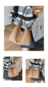 Detail of camel matte tote bag showing large capacity, soft texture and metal logo