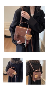 Retro brown leather square bag shown with detachable straps and teddy bear charm accessory