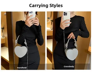 Sac de soirée argenté en forme de cœur porté à la main ou en bandoulière