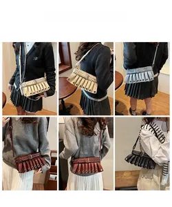 Collage of chic pleated crossbody bags in beige, blue, red, and black on model