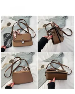 Brown crossbody bag with woven texture, metal lock, and leopard print scarf detail