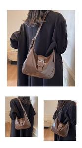 Detail of vintage brown Hobo bag with silver buckle and glossy oil wax leather finish