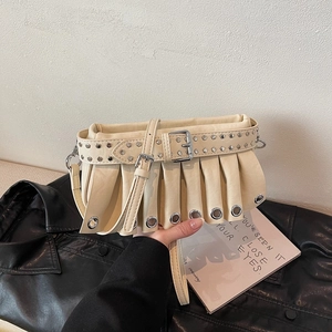 Chic beige pleated accordion shoulder bag with silver eyelets and belt detail