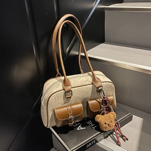 Retro Boston tote bag in beige and brown suede with plush bear pendant and dual front pockets