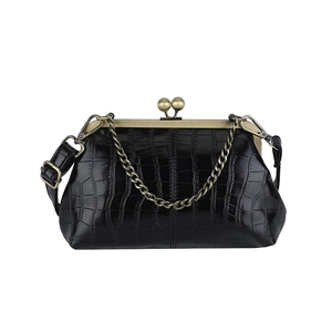 Retro black crocodile embossed handbag with golden ball clasp and versatile chain strap