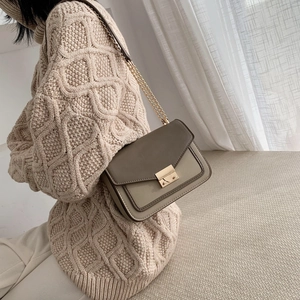 Retro color-block crossbody bag in brown and beige PU leather with gold chain strap