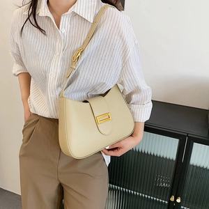 Minimalist beige baguette shoulder bag with gold metal buckle for women's casual style