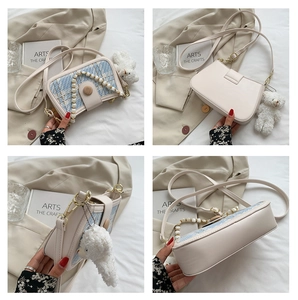 Detail view of mini crossbody bag with bear pendant and pearl chain in four angles