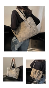 Détails de cabas gris vintage en cuir avec rivets et fermetures éclair de qualité