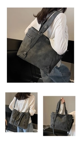 Vue détaillée du grand sac cabas anthracite avec texture mate et rivets décoratifs