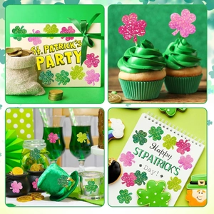 Glitter clover stickers on gift boxes and party cupcakes for St. Patrick's Day decor
