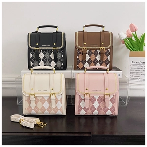 Quilted mini backpack collection in black, brown, beige, and pink with metal buckles