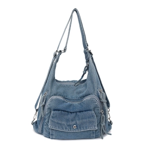 Versatile blue denim backpack with multi-pocket design and adjustable shoulder straps
