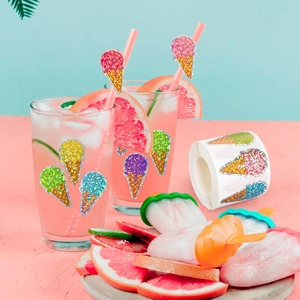 Detail of colorful glitter ice cream cone stickers applied on a refreshing summer drink cup