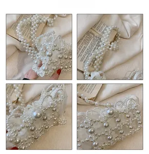 Close-up of handmade pearl woven handbag with delicate satin ribbons and beaded texture