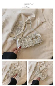 Detail of beaded pearl handbag showing elegant woven texture and long shoulder strap