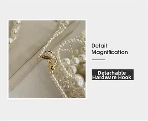 Detailed view of white pearl woven bucket bag with detachable golden metal hook