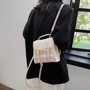 Chic quilted argyle backpack for girls with pink accents and detachable crossbody strap