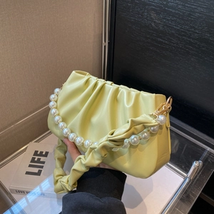 Chic pleated cloud shoulder bag in light green leather with elegant pearl chain handle