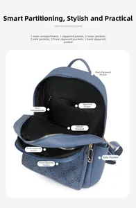 Detail view of the multi-compartment interior layout for this blue floral travel backpack