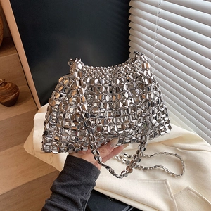 Fashionable silver metallic sequin woven shoulder bag with chain strap and hollow design