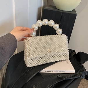 Elegant cream white pearl beaded handbag with large pearl top handle for weddings