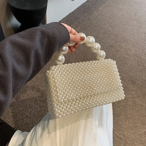 Elegant white pearl beaded handbag with large round top handle for women's fashion