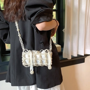 Fairy style white pearl woven crossbody mini bag with elegant ribbon bow for women