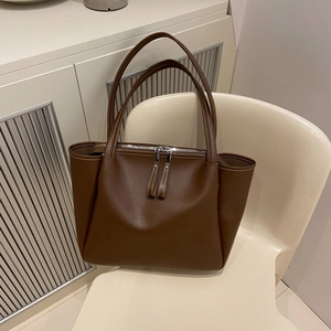 Deep brown large capacity tote bag with white contrast stitching and dual zipper closure