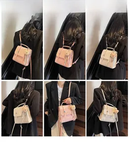 Detailed views of multifunctional women backpack in pink leather with teddy bear charm